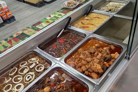 Prepared Filipino dishes at the Munting Kusina counter